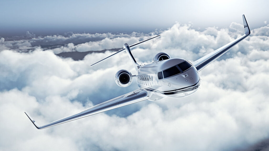 private jet flying above the clouds